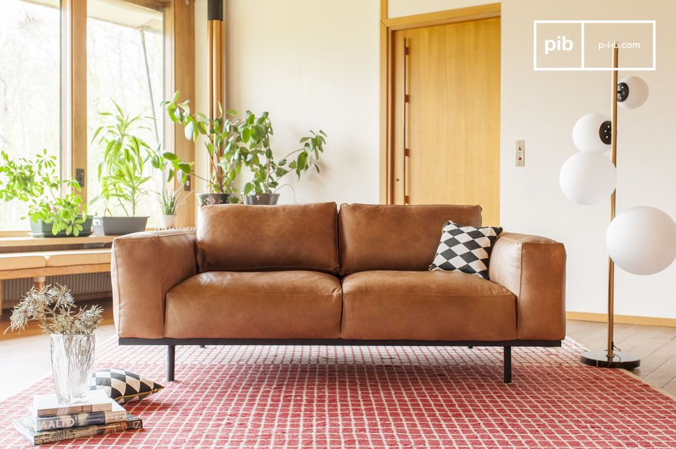 Ein Sofa mit Nougat-Nuancen, das an die Einflüsse der 60er Jahre erinnert.